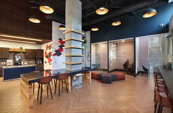 Modern workspace lounge with pendant lighting